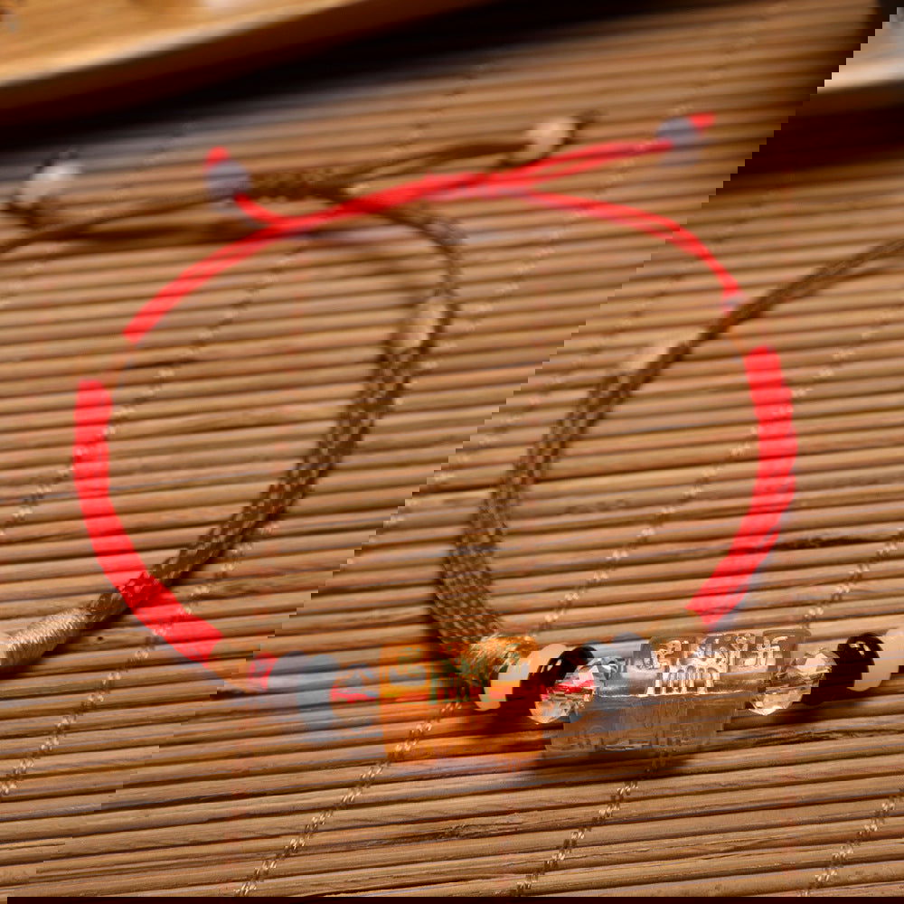 Red string bracelet with six-syllable mantra for the zodiac year - Oriental Buddha Karma  -  - 