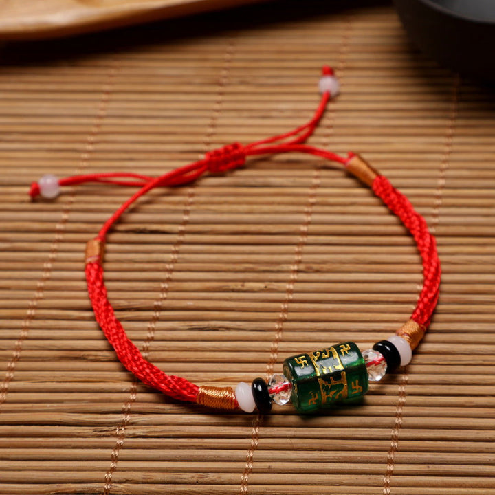 Red string bracelet with six-syllable mantra for the zodiac year - Oriental Buddha Karma  -  - 
