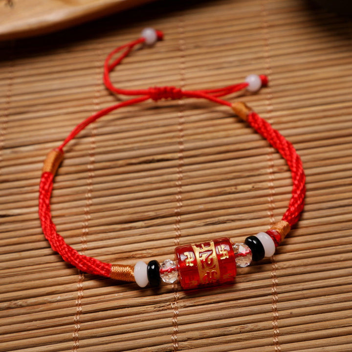 Red string bracelet with six-syllable mantra for the zodiac year - Oriental Buddha Karma  -  - 